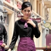 waitress black shirt + purple apron 